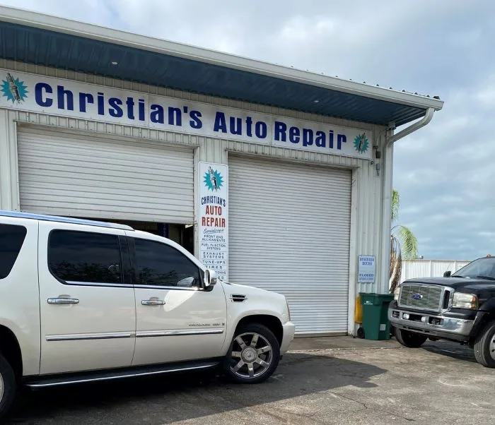 The Christian's Auto Repair shop on Chalmer Drive with its blue sign and open bays